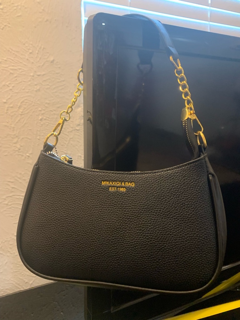 Women’s Black Shoulder Bag with Gold Hardware
